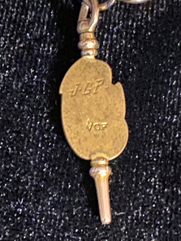 Back of charm, initials 